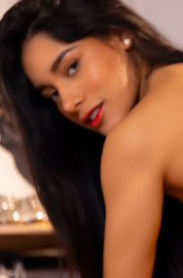 Carolina Guerreros Chocolate Skin Glistening Under Soft Light