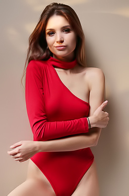 Emilia Hops Gorgeous Ukrainian Brunette Poses In A Simple Red Bodysuit