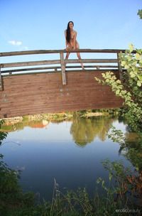 Lady Cate Entices Outdoors By A Lake In Denim Shorts And Barefoot Excitement
