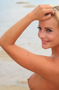 Emma Button Enjoying Outdoor Nude Fun At A Beach With Erect Nipples And Painted Nails