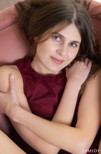 Luna Moonie Poses Nude On A Pink Chair Showcasing Her Natural Pubic Hair And Feet In Bedroom Scenes