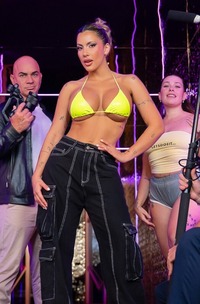 Kenia Music Entices With Her Exhibitionist Dance, Teasing Cameras As She Ignites The Club With Raw Passion