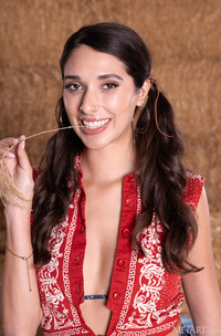 Aria Sloane American Brunette Swishes Her Long Pigtails With A Sassy Smile