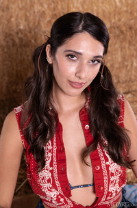 Aria Sloane American Brunette Swishes Her Long Pigtails With A Sassy Smile