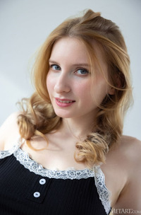 Azzura Relaxing In Her Home Office