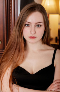 Evelin Her Soft Breasts Bare And Her Mesmerizing Blue Eyes Shining Seductively