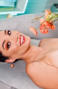 Harley Melts Poses Confidently In Lingerie For Captivating Bedroom Photoshoot