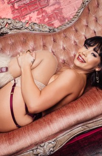 Beca Barbie Poses In Burgundy Lace Lingerie On Velvet Couch With Thigh Highs And Fur Coat Tease