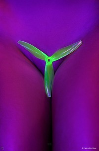 Lia Mango Oiled Up And Topless In Neon-lit Solo Tease With Lingerie And Brick Wall Backdrop