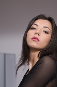 Mitzi X Teases With Sheer Stockings And Playful Skirt Twirls Indoors