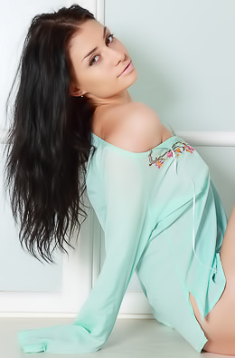 Dark-haired chick gives a close-up view of her pussy.