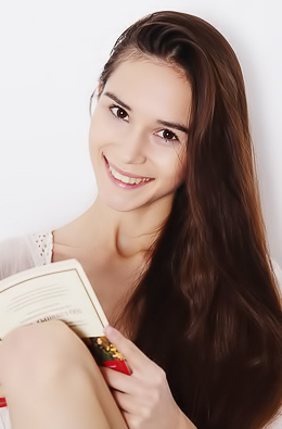 Leona A Strokes Her Shaved Pussy