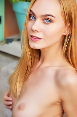 Nancy A - Gorgeous blonde model goes naked on the outside