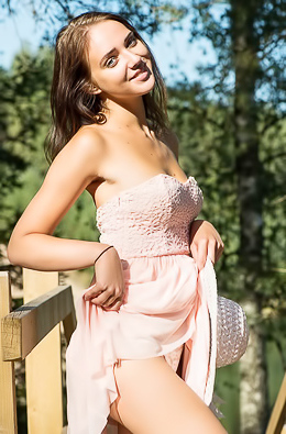 Amazing brunette is happy to get naked