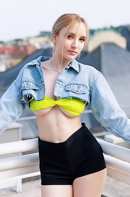 Polly Yangs Brandishing Her Favorite Toy With A Look