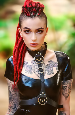 Tattooed Girl In Black Latex Dress