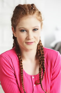 Foxy Sofilie Cute Redhead Unfastens Her Bodysuit