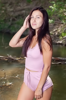 Melania Splashing Herself So Her Wet Shirt Clings To Her Perky Breasts Alluringly