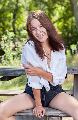 Skye Bloom Perching On A Picnic Table In The Park