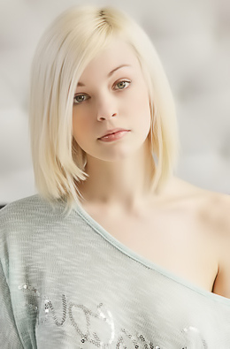 Skinny, platinum-blonde Bree strips