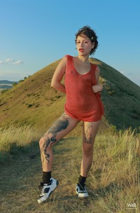 Lilith Baph Climbs For Pleasure Amid Sunsets Glow On Hilltop